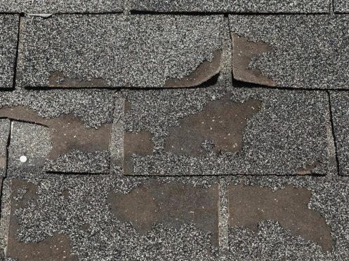 worn asphalt roof shingle